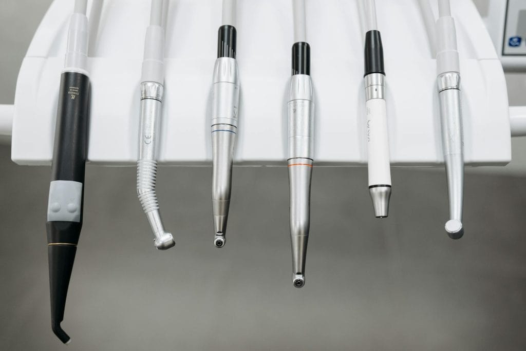 a close up of dental instruments